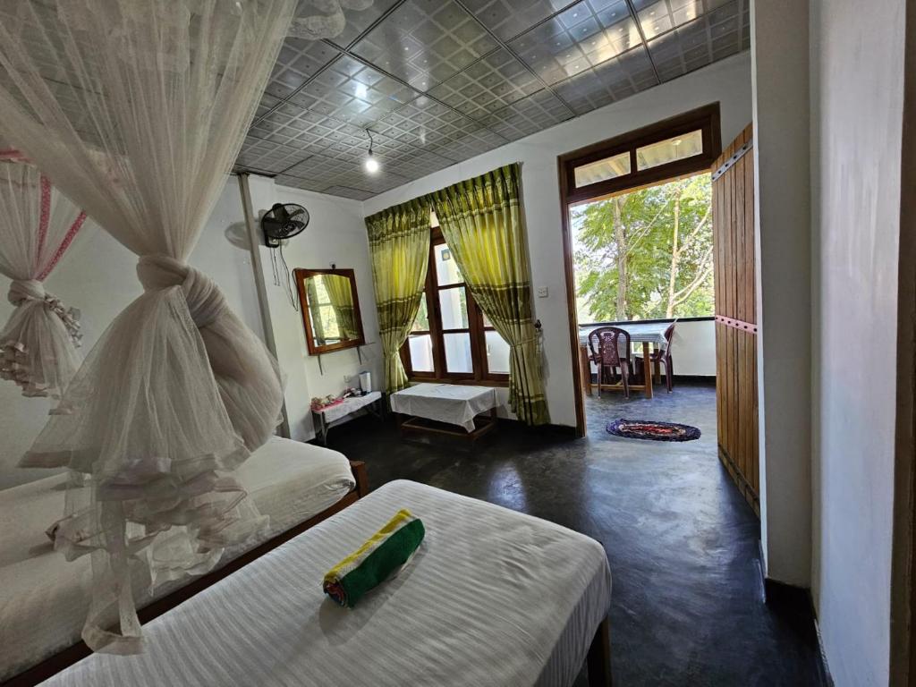 Postel nebo postele na pokoji v ubytování Enthral View Homestay