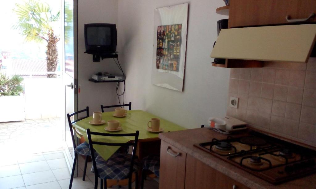 Kuchyň nebo kuchyňský kout v ubytování Apartments Mare Losinjska 16