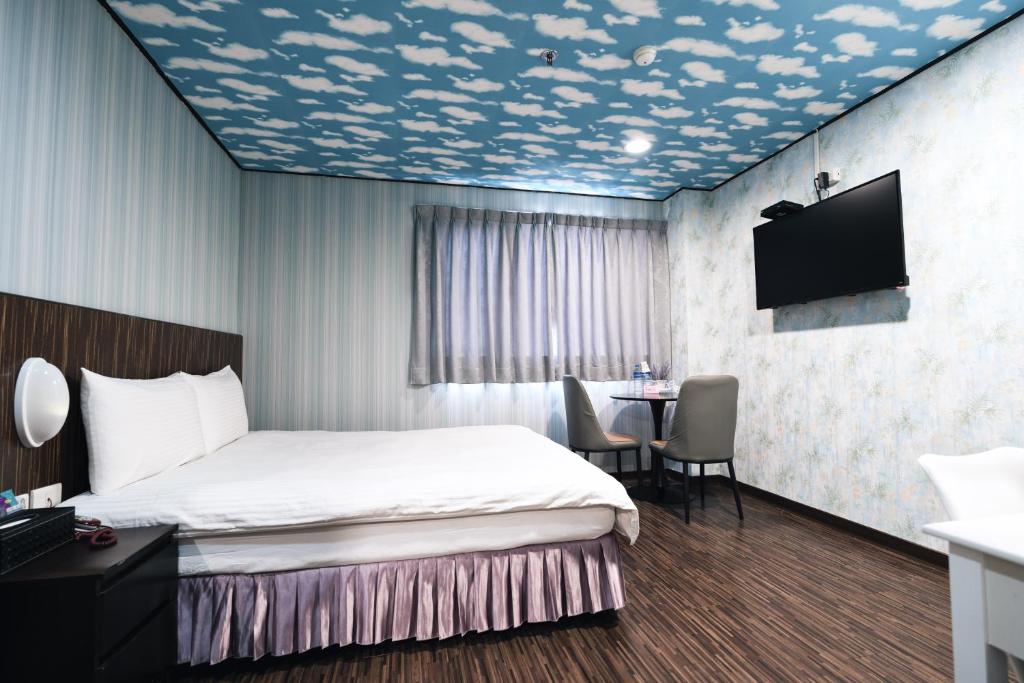 Postel nebo postele na pokoji v ubytování Sofu Hotel