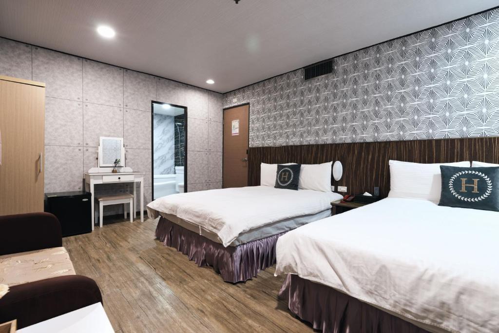 Postel nebo postele na pokoji v ubytování Sofu Hotel
