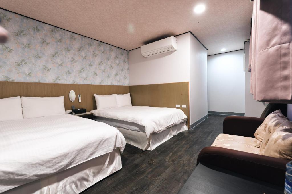 Postel nebo postele na pokoji v ubytování Sofu Hotel