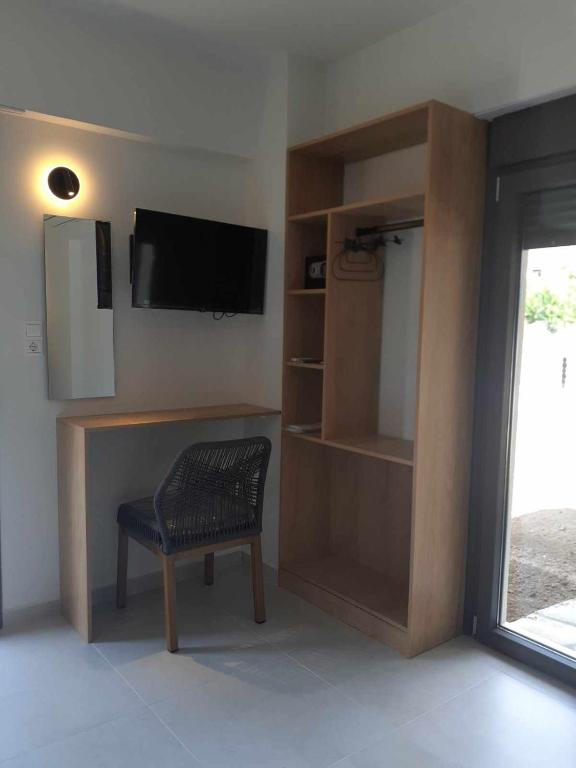 TV a/nebo společenská místnost v ubytování ACTA Luxury Rooms