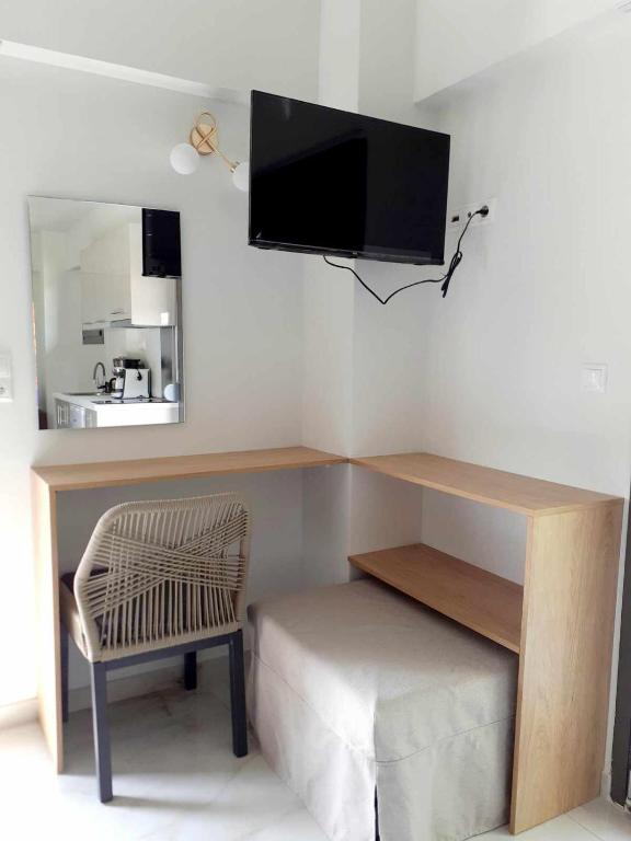 TV a/nebo společenská místnost v ubytování ACTA Luxury Rooms