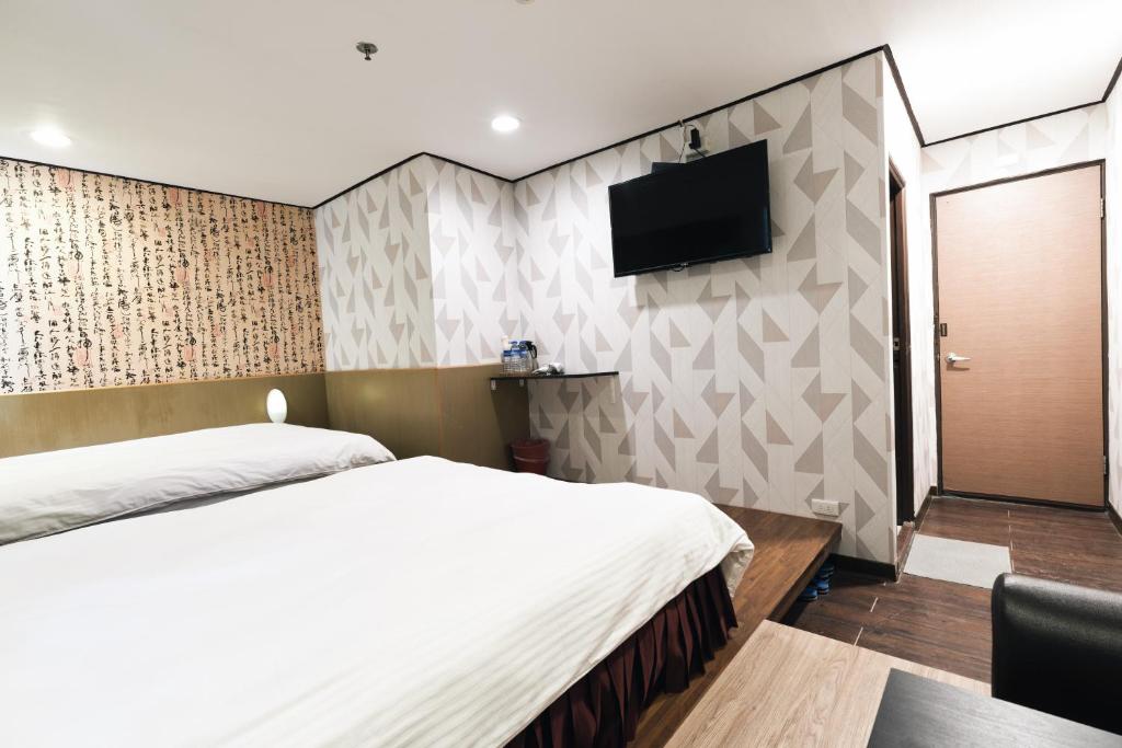 TV a/nebo společenská místnost v ubytování Sofu Hotel