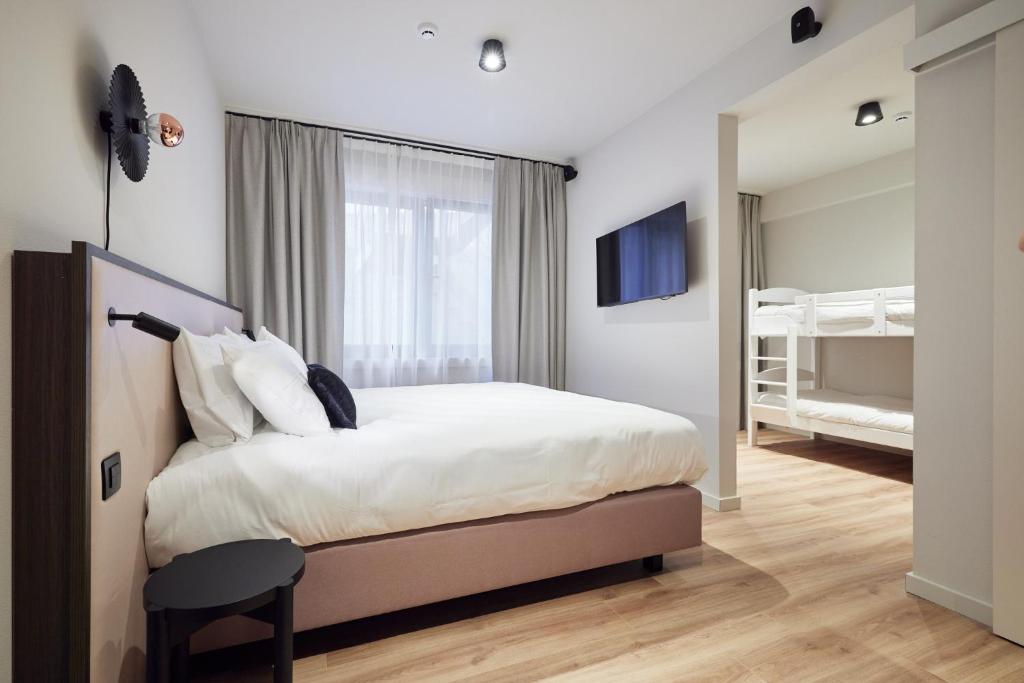 Postel nebo postele na pokoji v ubytování Rosa Hotel