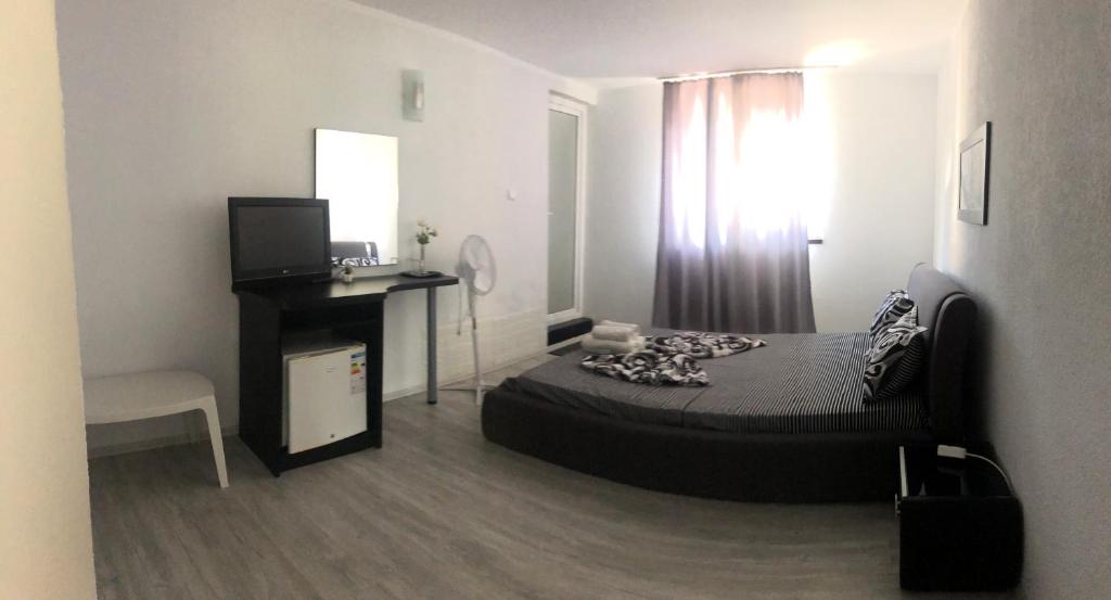 Postel nebo postele na pokoji v ubytování Casa Athena
