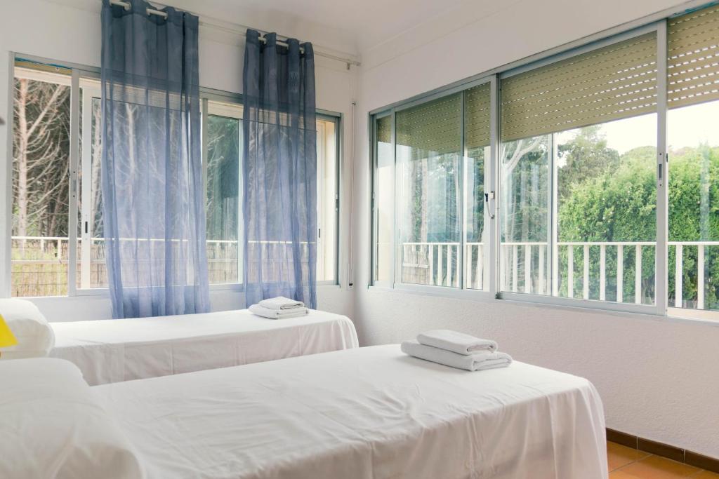 Posteľ alebo postele v izbe v ubytovaní Apartaments Falcó