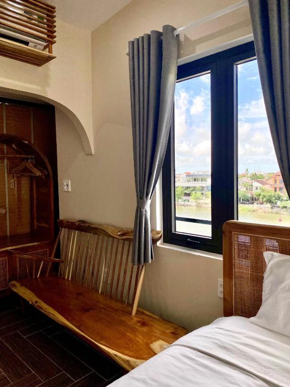 Giường trong phòng chung tại Hue Sweethouse 2 Homestay