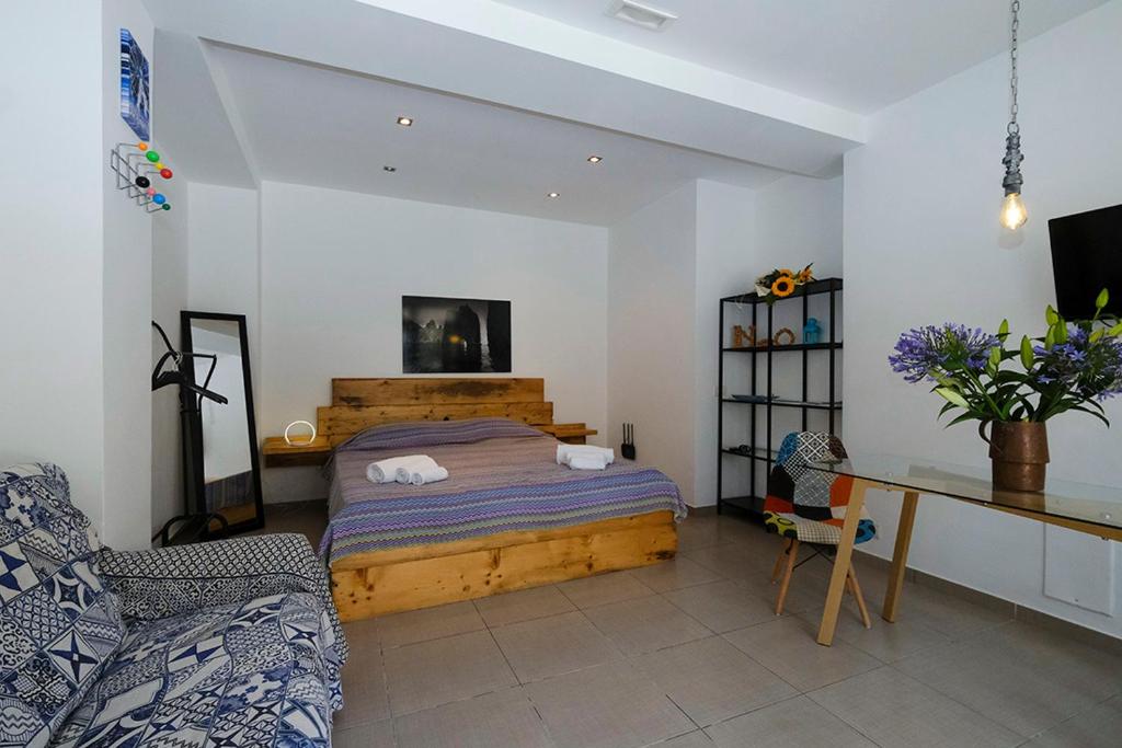 Łóżko lub łóżka w pokoju w obiekcie Numero20 B&B