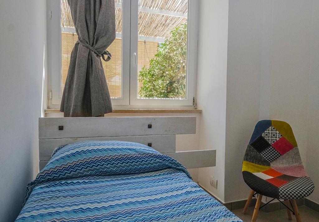 Łóżko lub łóżka w pokoju w obiekcie Numero20 B&B