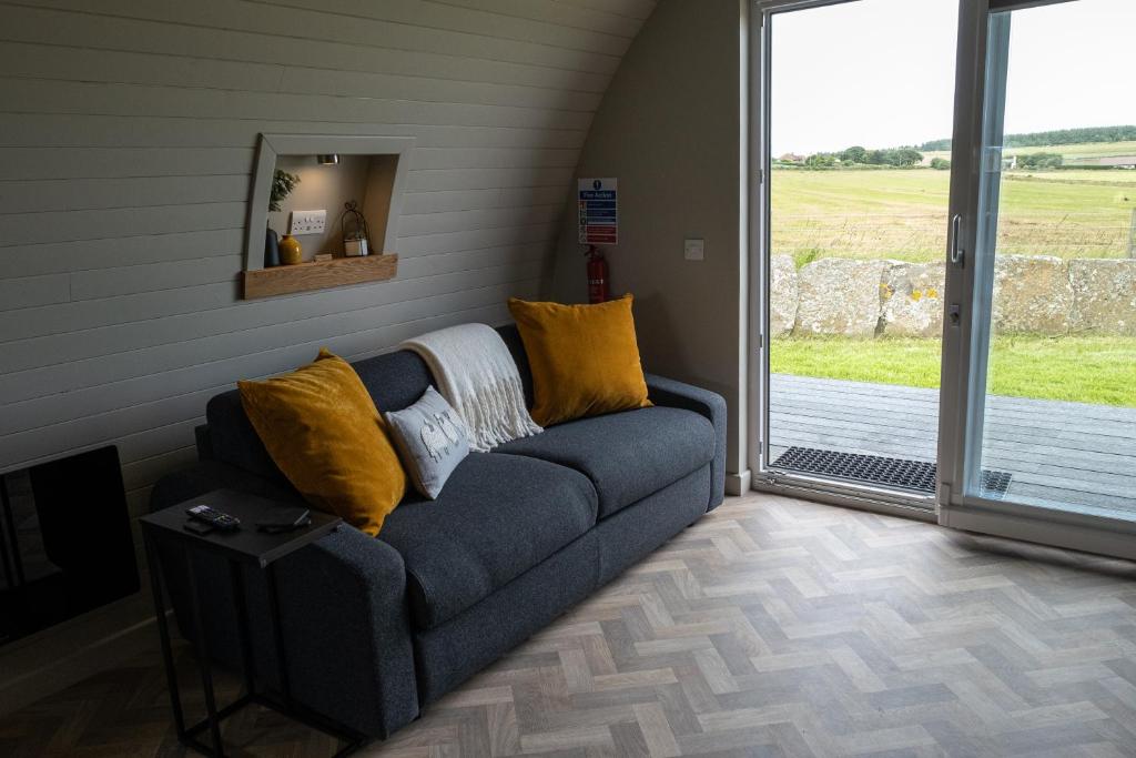 Posezení v ubytování Glengolly Getaways