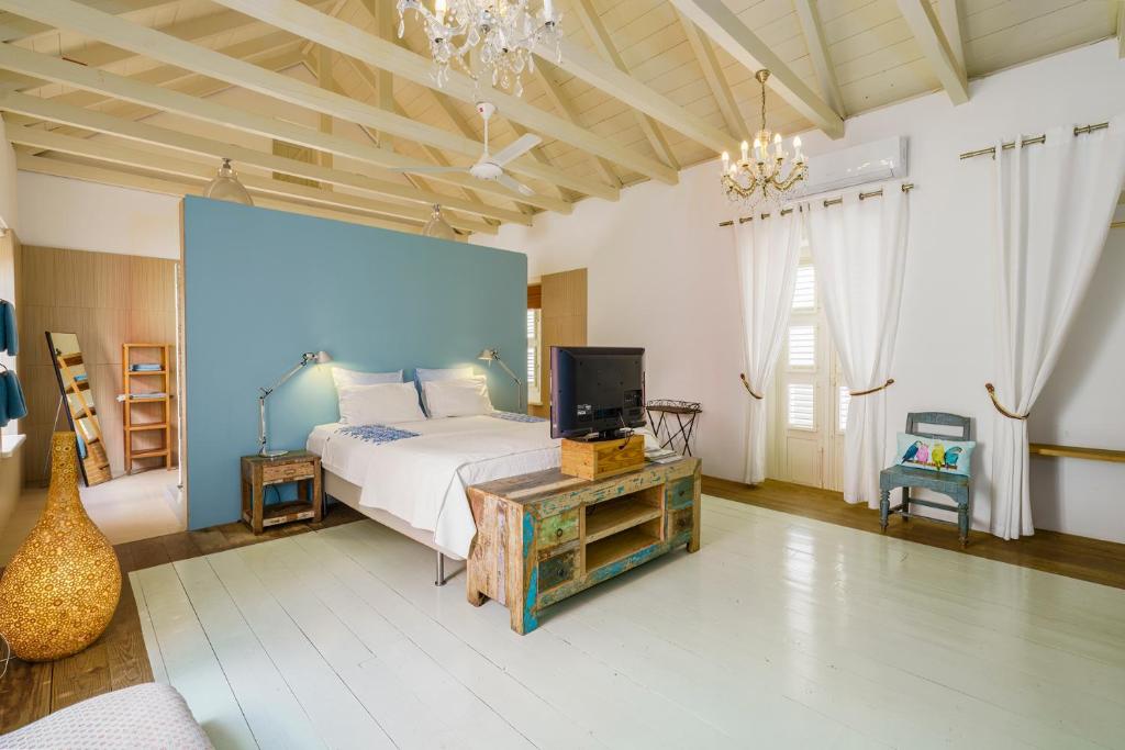 Postel nebo postele na pokoji v ubytování Villa Tokara