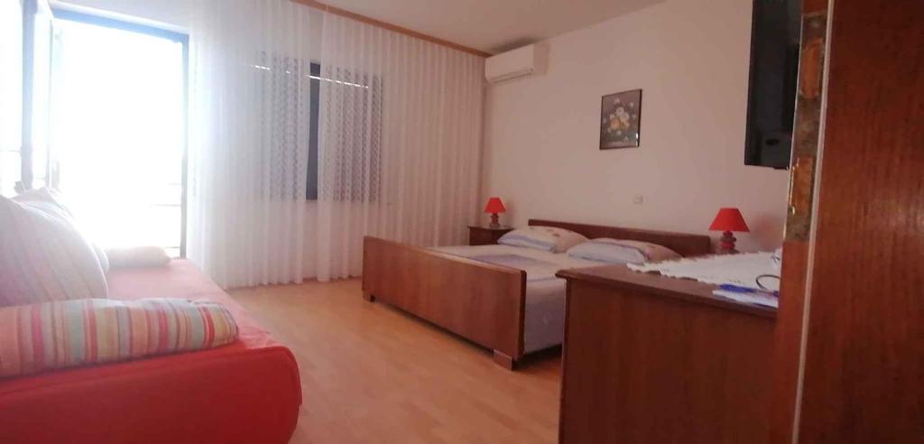 Posteľ alebo postele v izbe v ubytovaní Apartments in Crikvenica 43359