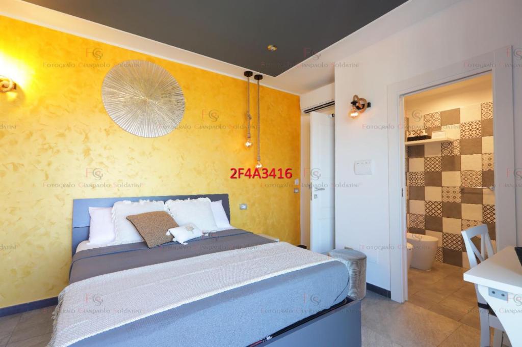 Postel nebo postele na pokoji v ubytování Luxe sur Mer B&B Sorrento