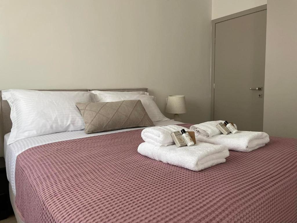 Postel nebo postele na pokoji v ubytování Morpheus boutique apartment