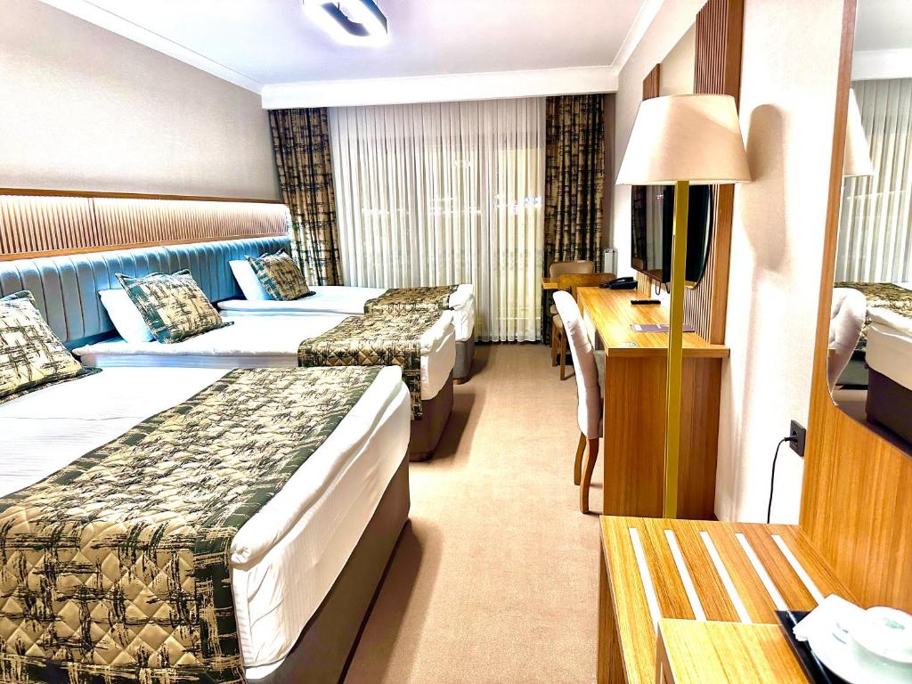Özkaya Otel - Habitación Cuádruple