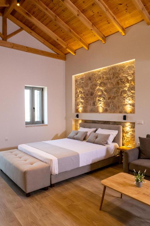 Postel nebo postele na pokoji v ubytování Olivar Suites