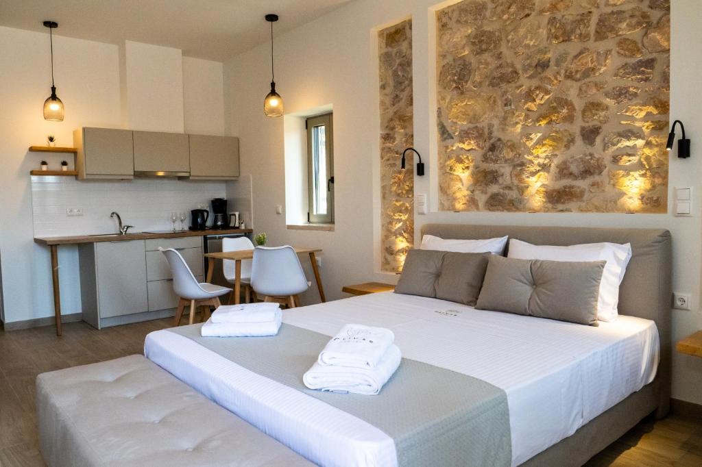 Postel nebo postele na pokoji v ubytování Olivar Suites