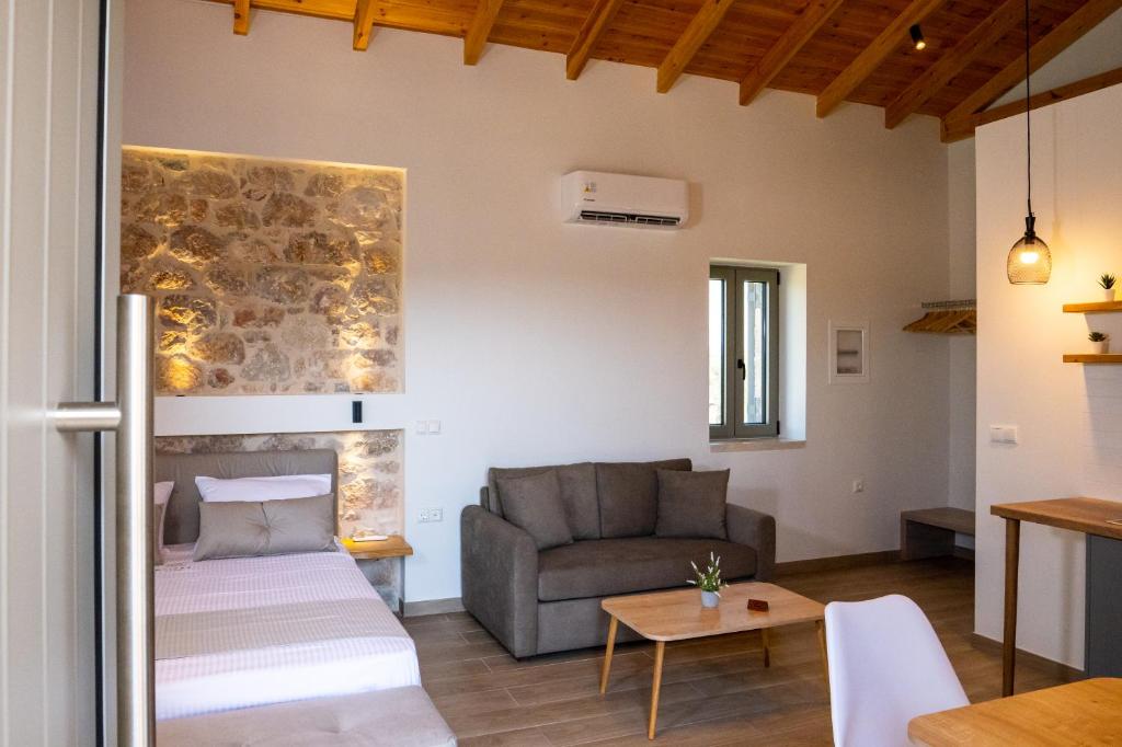 Postel nebo postele na pokoji v ubytování Olivar Suites