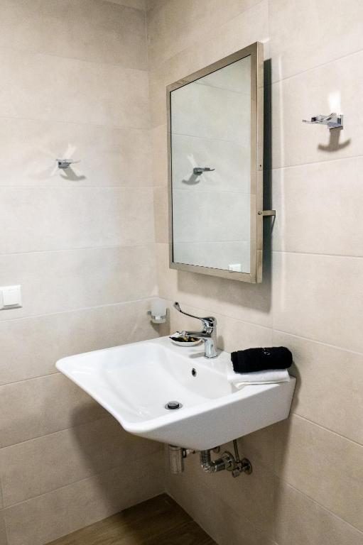 Koupelna v ubytování Olivar Suites