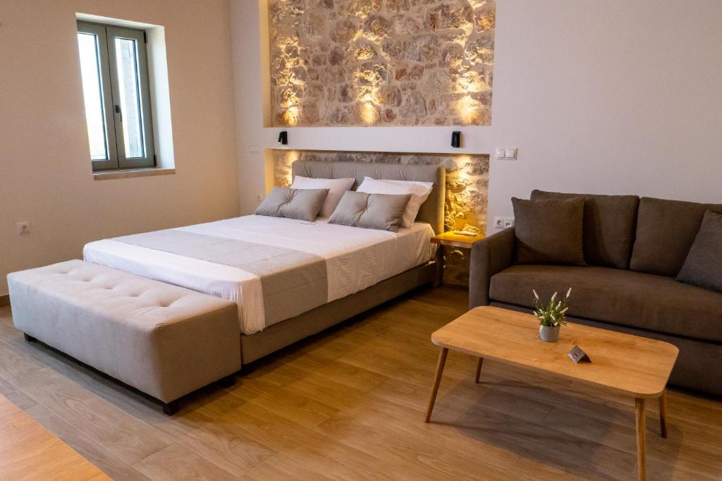 Postel nebo postele na pokoji v ubytování Olivar Suites