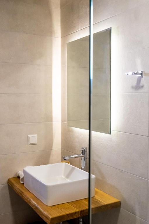 Koupelna v ubytování Olivar Suites