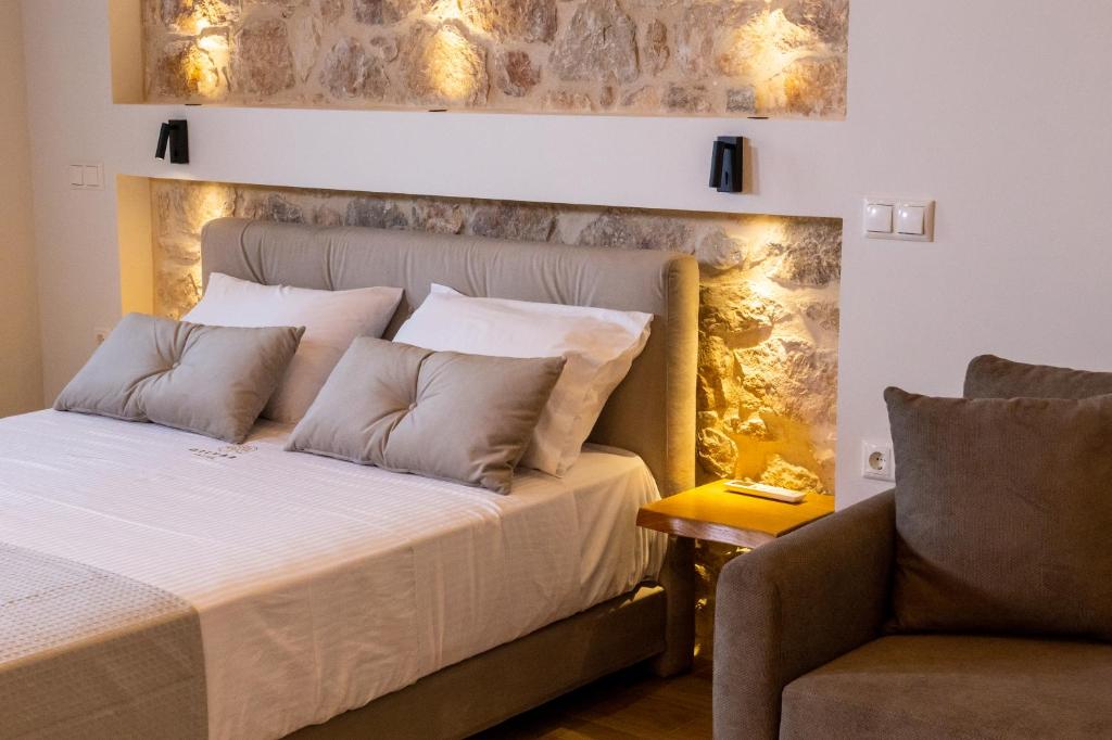 Postel nebo postele na pokoji v ubytování Olivar Suites