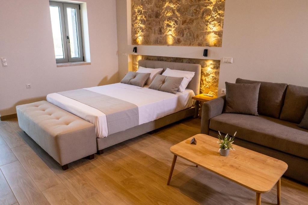Postel nebo postele na pokoji v ubytování Olivar Suites