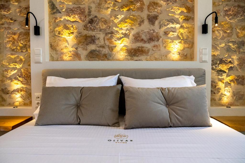 Postel nebo postele na pokoji v ubytování Olivar Suites