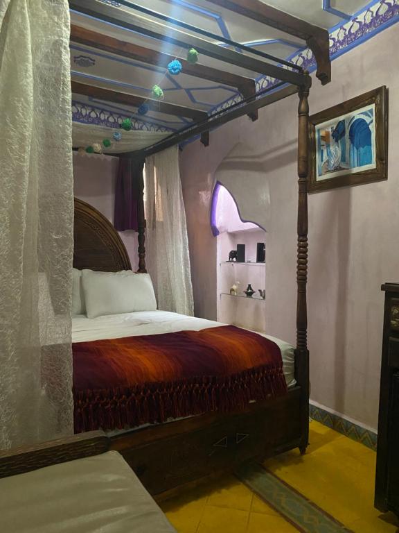 Postel nebo postele na pokoji v ubytování Riad Azurite