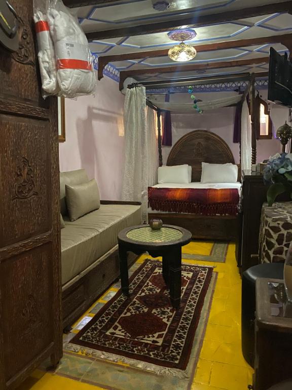 Postel nebo postele na pokoji v ubytování Riad Azurite