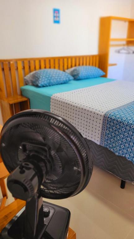 Voodi või voodid majutusasutuse Praieira Hostel&Pousada toas
