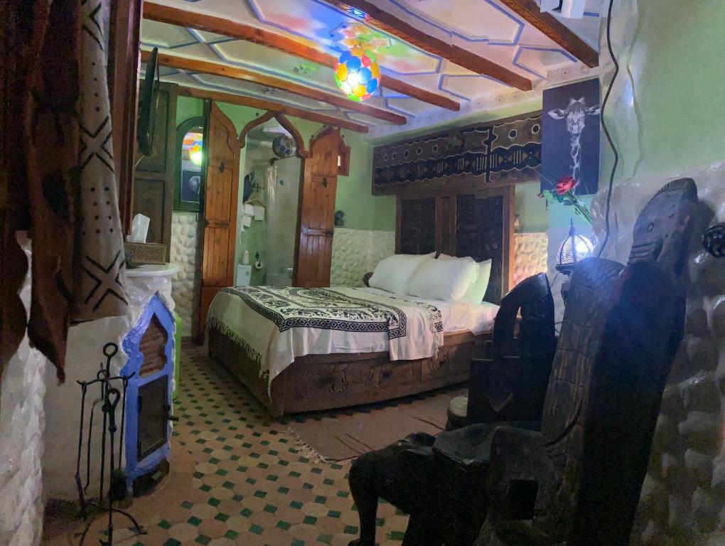 Postel nebo postele na pokoji v ubytování Riad Azurite