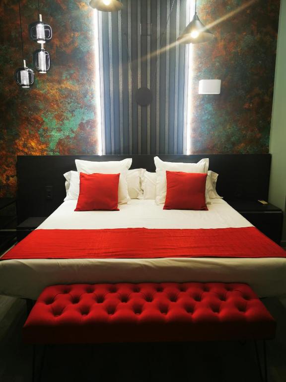 Postel nebo postele na pokoji v ubytování Hotel Pepo