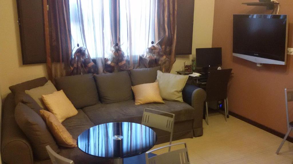 TV a/nebo společenská místnost v ubytování Acitrezza B&B