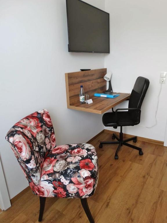 TV a/nebo společenská místnost v ubytování Hotel Gleis 3viertel Jena