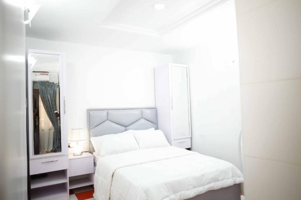 Posteľ alebo postele v izbe v ubytovaní DMK Apartments