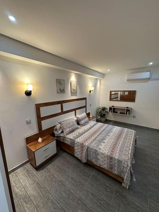 Ένα ή περισσότερα κρεβάτια σε δωμάτιο στο Kahina loft