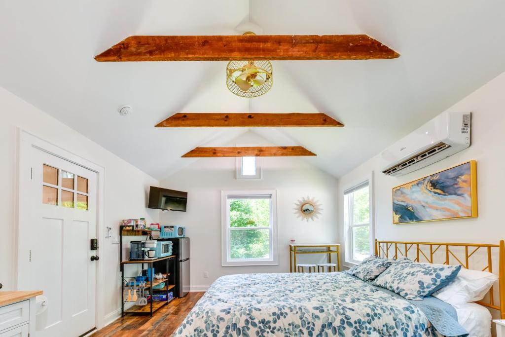 a bedroom with a bed and a wooden ceiling at Charming Winston-Salem Studio on Miller Park! in Winston-Salem