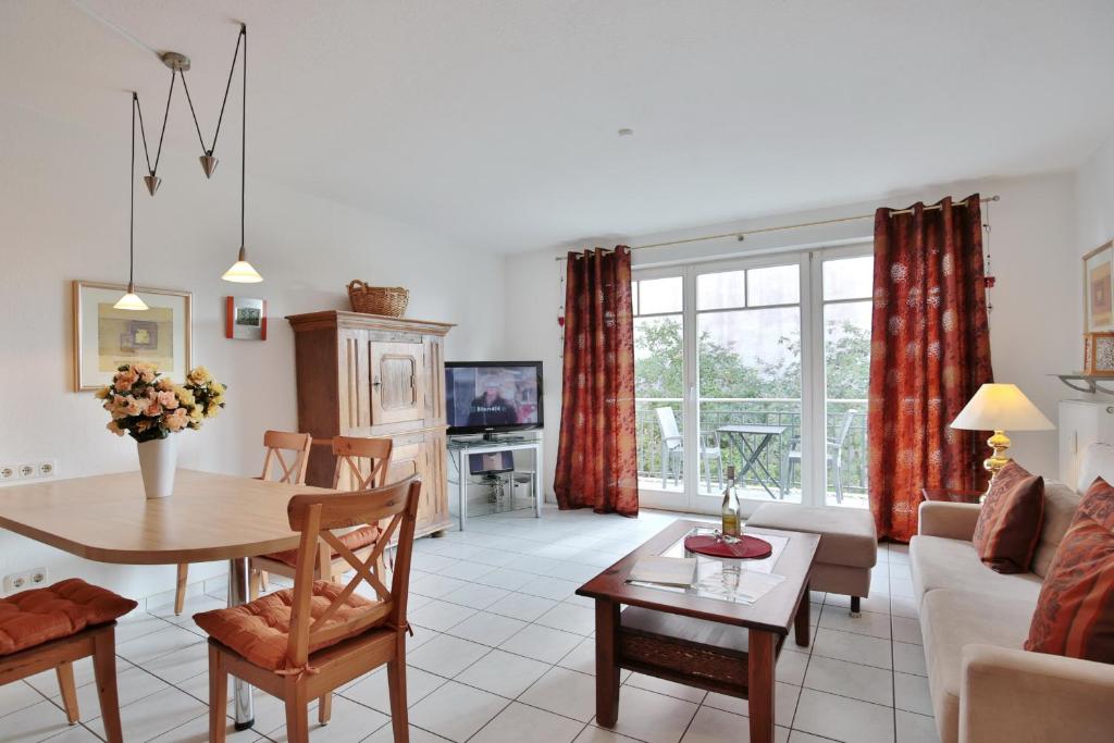 Μια τηλεόραση ή/και κέντρο ψυχαγωγίας στο Haus Strandstrasse 150 Appartement 11