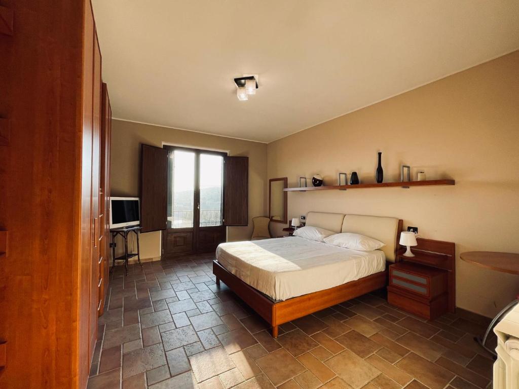 Postel nebo postele na pokoji v ubytování Agriturismo BioCore 2 - Colledoro