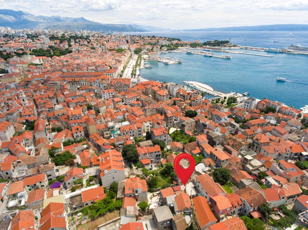 an aerial view of a city with a red heart at Apartment Corner in Split