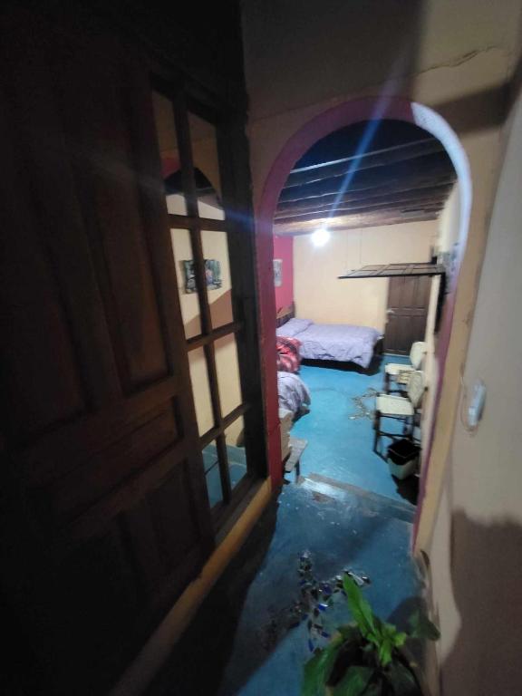 Postel nebo postele na pokoji v ubytování HOTEL RINCÓN MAGICO REAL DE CATORCE