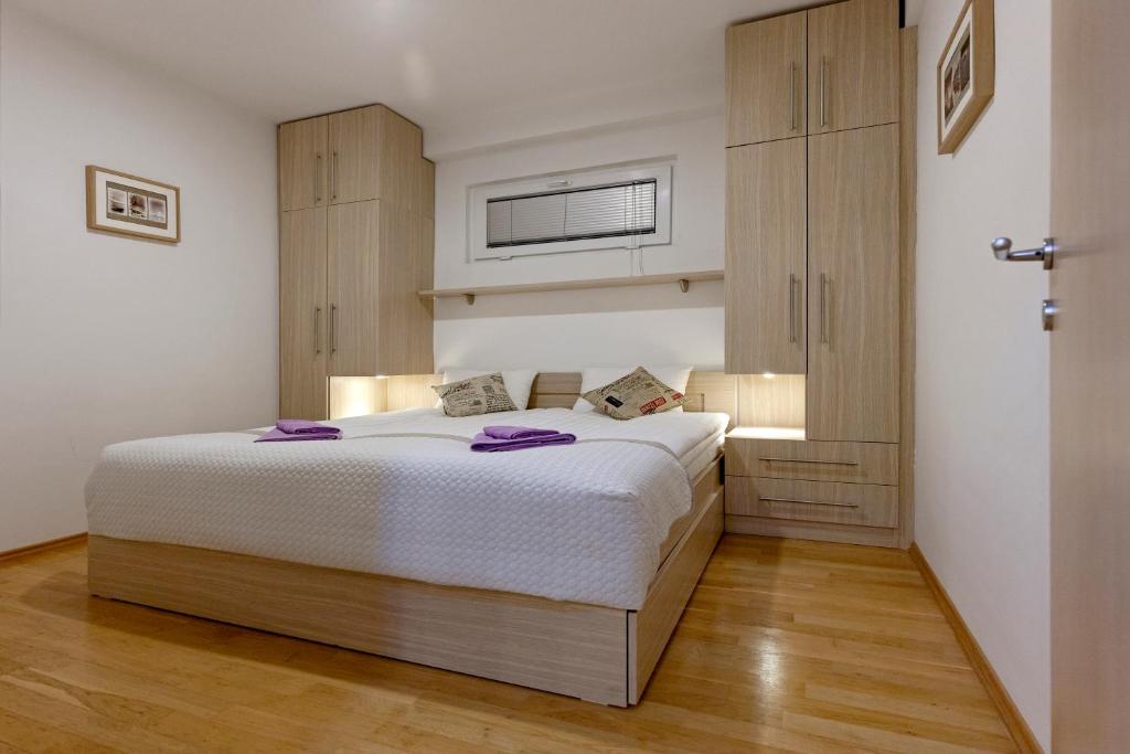 Ένα ή περισσότερα κρεβάτια σε δωμάτιο στο Apartment Katja