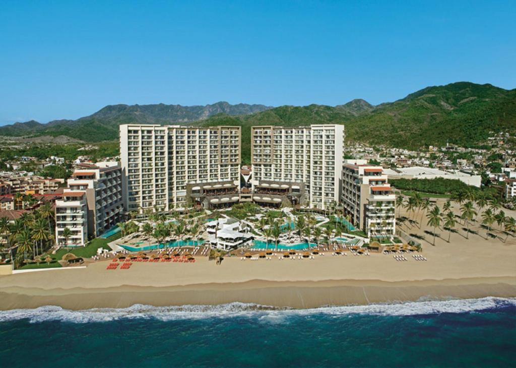 an aerial view of a resort on the beach at Secrets Vallarta Bay Resort & SPA - Adults Only in Puerto Vallarta
