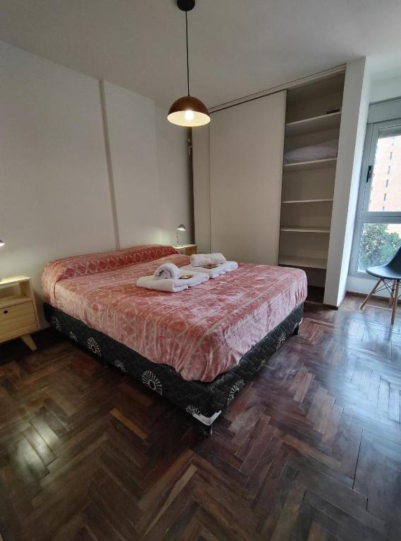 Postel nebo postele na pokoji v ubytování Paraná Terrazas Nva Cordoba