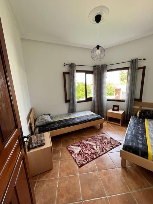 Postel nebo postele na pokoji v ubytování Appart magnifique Cabo Negro