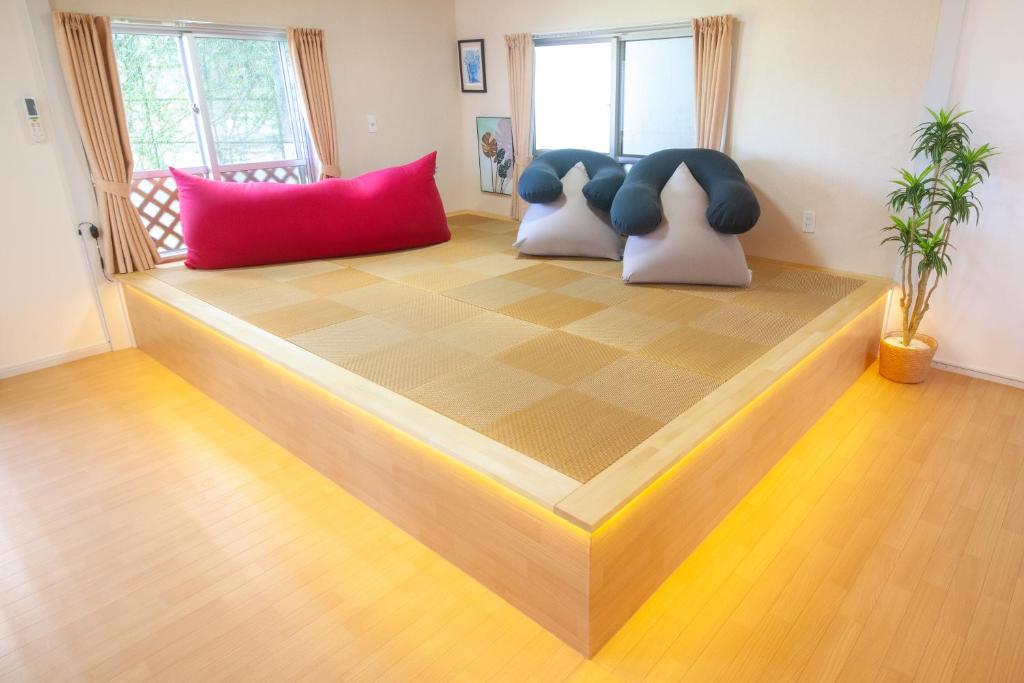 Postel nebo postele na pokoji v ubytování guesthouse みつば