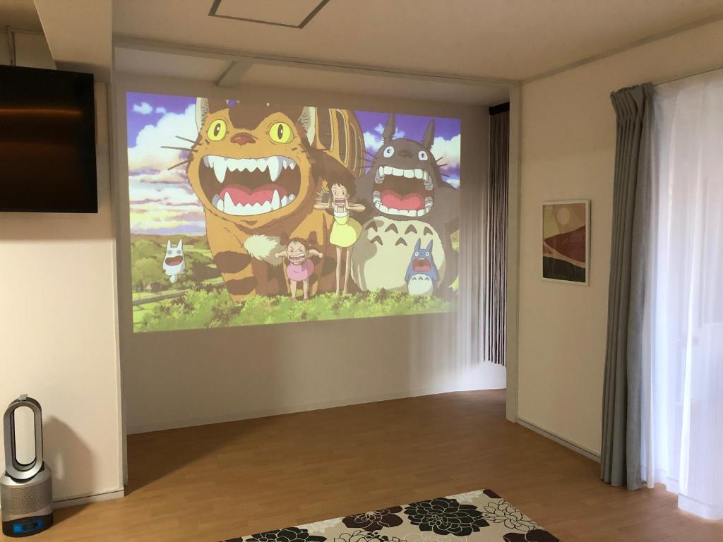 TV a/nebo společenská místnost v ubytování guesthouse みつば