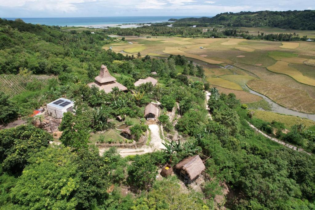 an aerial view of a house in the woods at Sumba Farm House in Sumba